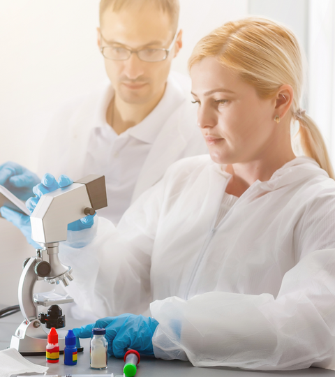 scientists analyzing products