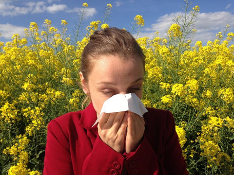 woman suffering from seasonal allergies