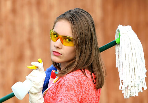 young lady ready for spring cleaning