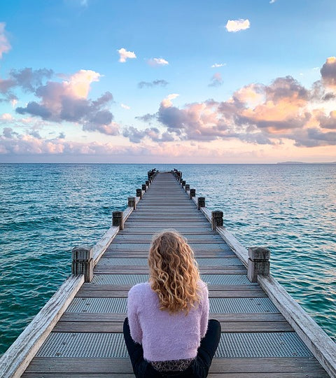 woman meditating in nature