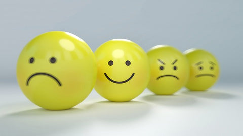 smiley faces showing different moods